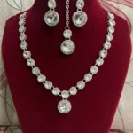 crystal stone necklace set with earrings and maang tikka
