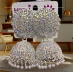 ad stone heavy jhumka earrings with pearl drops silver finish