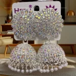 ad stone heavy jhumka earrings with pearl drops silver finish