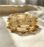 gold ghungroo bangles set
