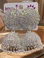 ad stone heavy jhumka earrings with pearl drops silver finish