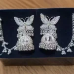 butterfly oxidised silver jhumka earrings with ghungroo chain design