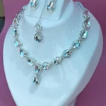 crystal teardrop necklace set with earrings and maang tikka silver plated bridal jewellery
