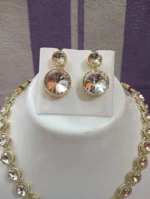 gold crystal necklace set with round stones and pendant earrings