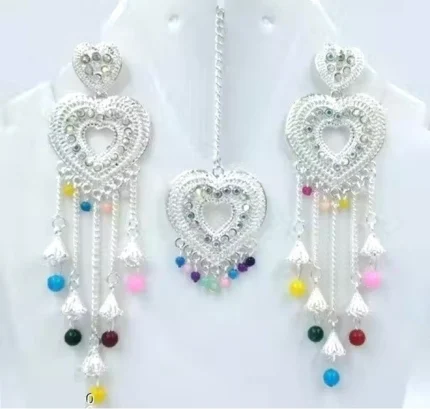 silver heart design necklace set with multicolor beads earrings and maang tikka
