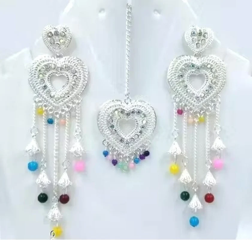 silver heart design necklace set with multicolor beads earrings and maang tikka