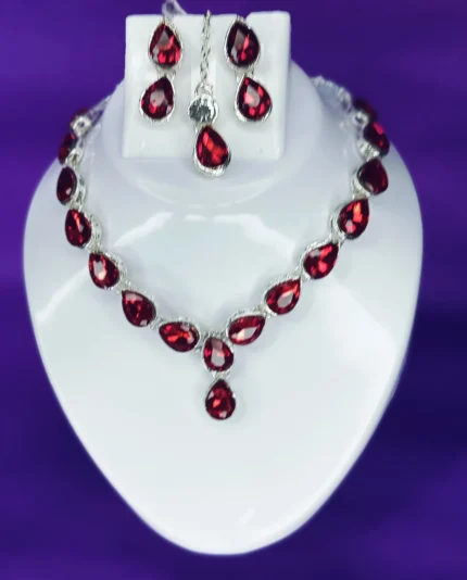 red crystal drop necklace set with earrings and maang tikka silver plated