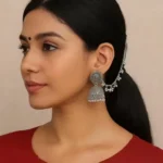 traditional jhumka earrings with ear chain styling