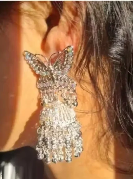 butterfly oxidised jhumka earrings with chain ghungroo design