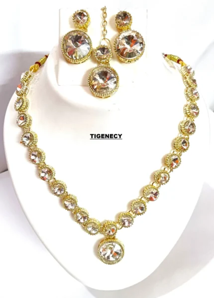 gold crystal necklace set with round stones and pendant earrings